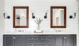 two-custom-made-mirrors-and-a-sink-in-a-bathroom